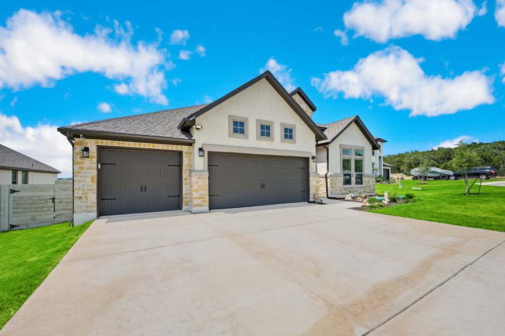 A finished concrete driveway.